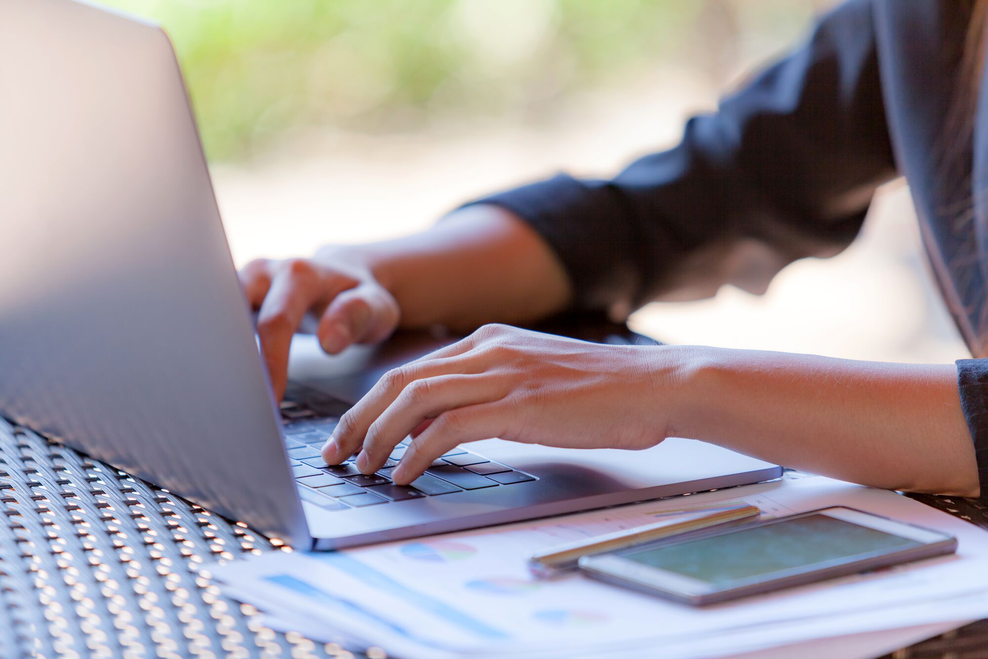 Business owner computing data on his laptop